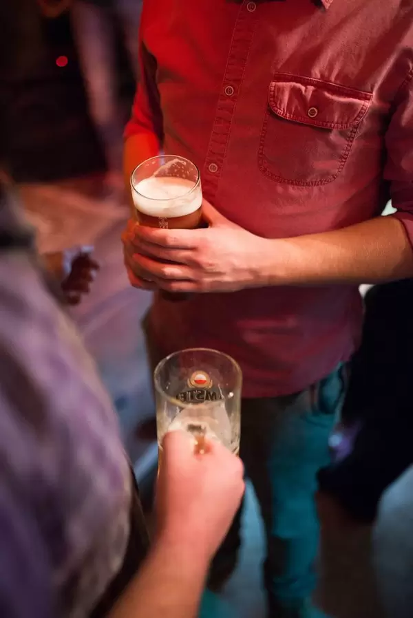 Two friends having a beer