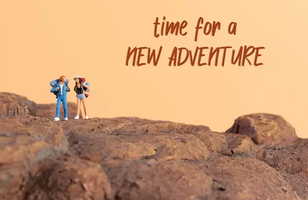 Two hikers and Time for a new adventure text