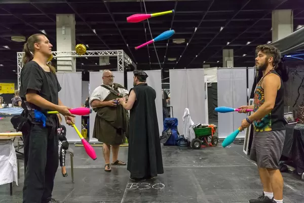 Two jugglers juggling
