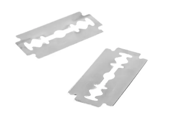 Two metal blades on a white background