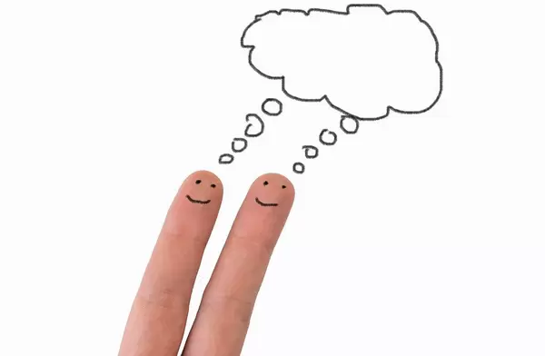 Two painted happy fingers thinking