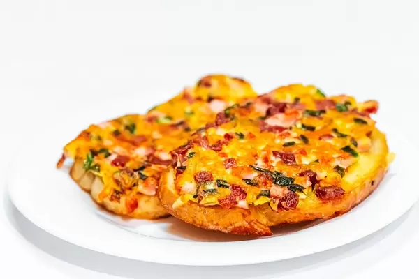 Two pizza sandwich on a white plate (Flip 2019)