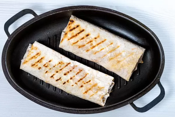 Two Shawarma in the pan. Top view (Flip 2019)