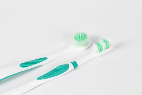 Two toothbrushes isolated on white