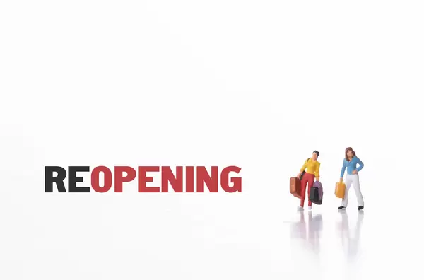 Two women with bags and Reopening text