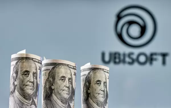 Ubisoft Entertainment - video game company logo and us dollar bills