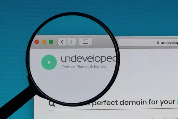 Undeveloped logo under magnifying glass