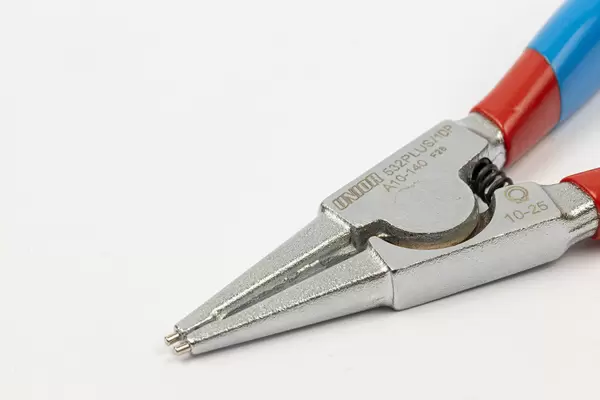 Unior External Lock Ring Pliers with copy space above white background