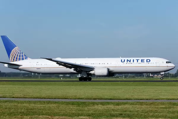 United Airlines taking off from runway, Amsterdam Schiphol Airport AMS