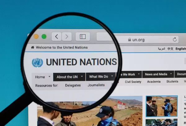 United Nations logo under magnifying glass