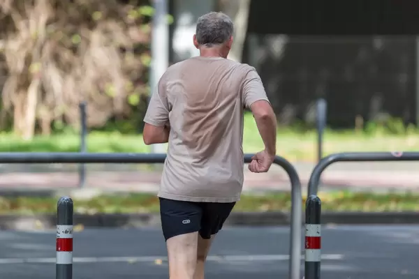 Urban sports: man doing jogging in the city