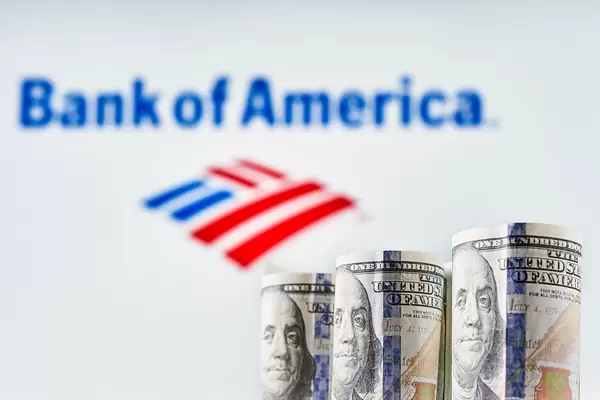 US dollar bills and Bank of America logotype on the background