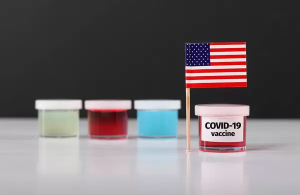 USA flag with Covid-19 vaccine