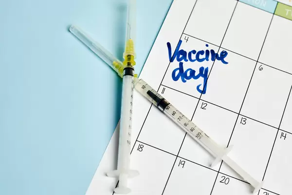 Vaccine day written on the calendar date