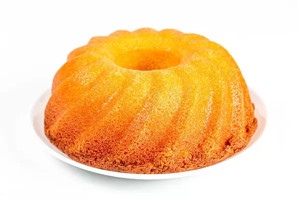 Vanilla classic cupcake on a white background