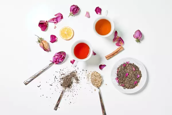 Variety of multi-colored dried tea leaves and flowers from above