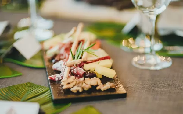 Variety of snacks on a white plate. (Flip 2019)