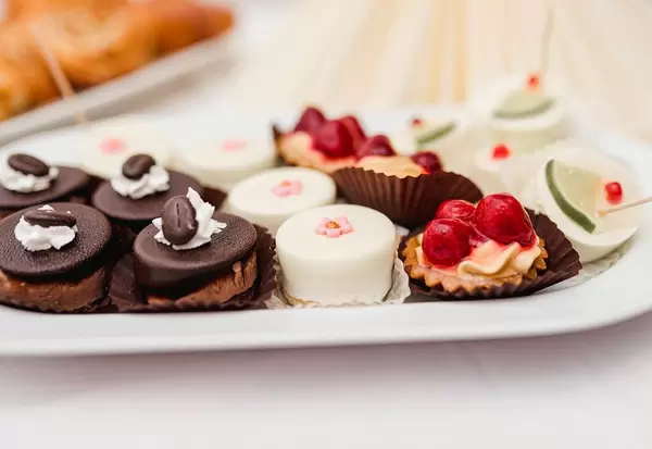 Variety Of Sweet Cakes With Coffee, Rasberries And Cream (Flip 2020)