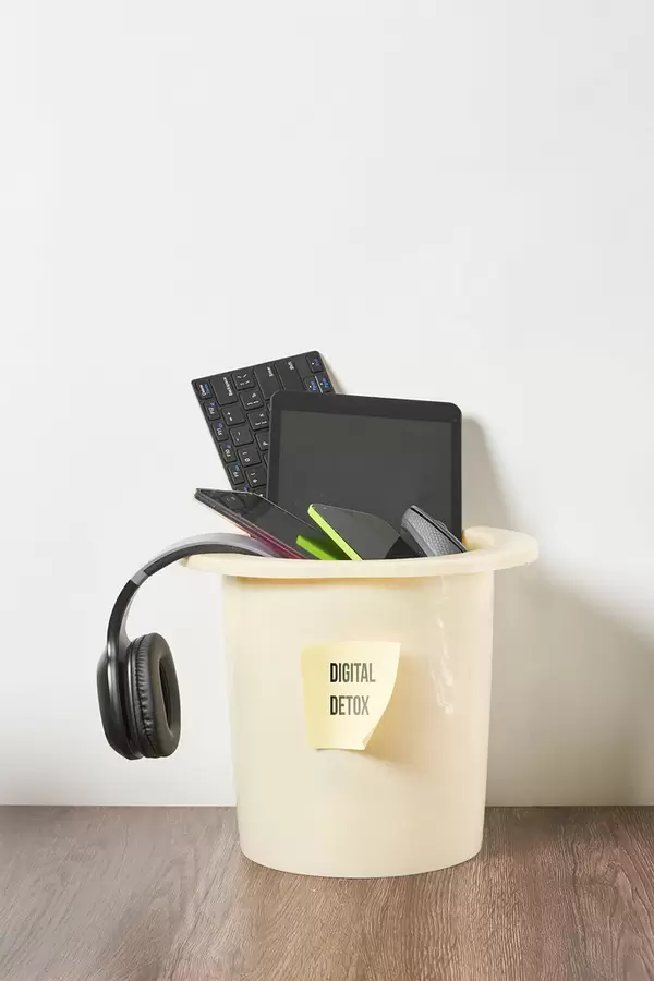 Various digital devices in the garbage bin. Digital detox