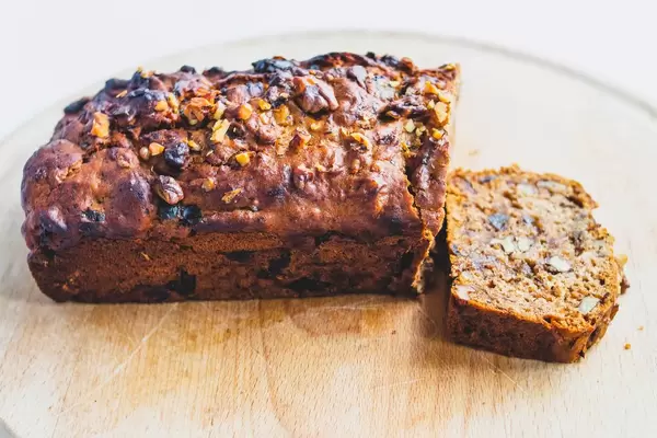 Vegan date walnut bread on wooden board