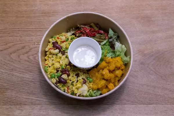 Vegan Organic Vitality Bowl: Asian millet bowl with teriyaki tofu, butternutsalad with dates and coconut-lime dressing