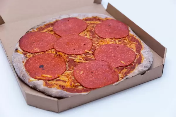 Vegan pizza with salami recently launched by Vapiano. Here in a take-away packaging