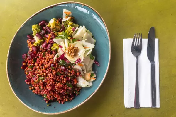 Vegan salad with red lentils, radish, broccoli and beetroot