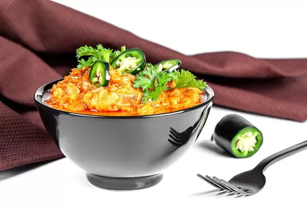 Vegetable stew with green hot peppers and fresh parsley