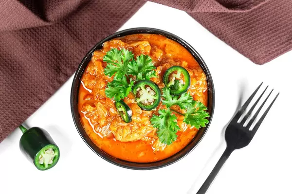 Vegetable stew with tomato sauce and hot pepper, top view