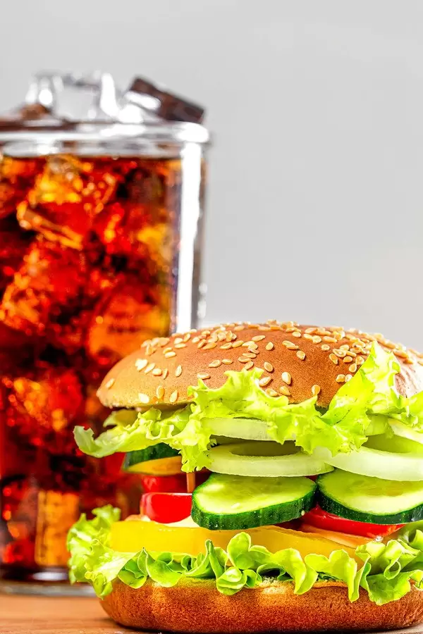 Vegetable vegetarian Burger with a cold glass of Pepsi (Flip 2019)