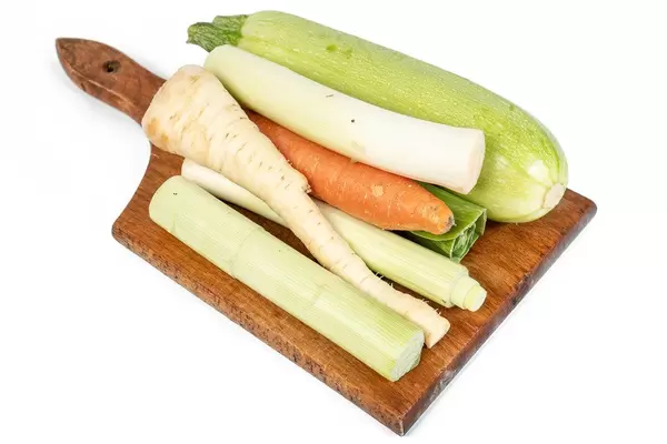 Vegetables on the cutting board isolated above white background (Flip 2019)