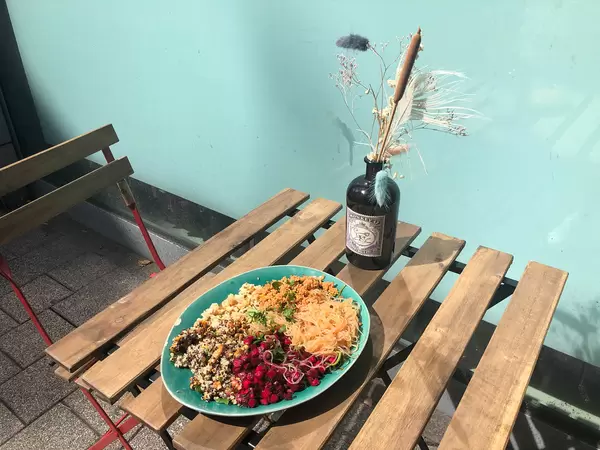 Vegetarian bowl from pasta, beetroot, cauliflower, couscous and quinoa with sweet potato