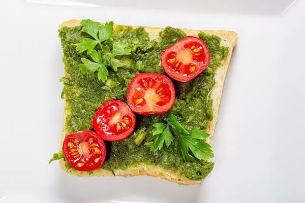 Vegetarian healthy food concept. Sandwich with greens and tomatoes. Top view (Flip 2019)