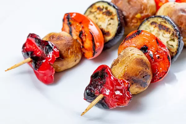 Vegetarian shashlik on a wooden skewer of vegetables (Flip 2019)