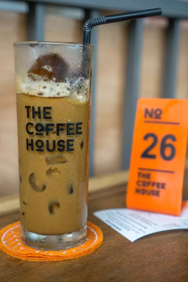 Vietnamese Iced Coffee with Order and Receipt in the Background