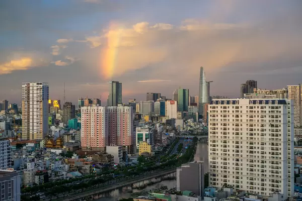 View of Ho Chi Minh City Downtownand Saigon River with Sunset Reflection in the Sky in Saigon, Vietnam