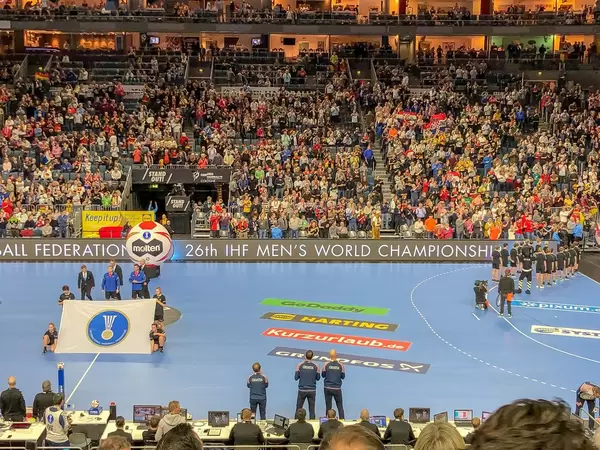 View of stadium with handball field with grandstand full of fans at Handball World Cup 2019