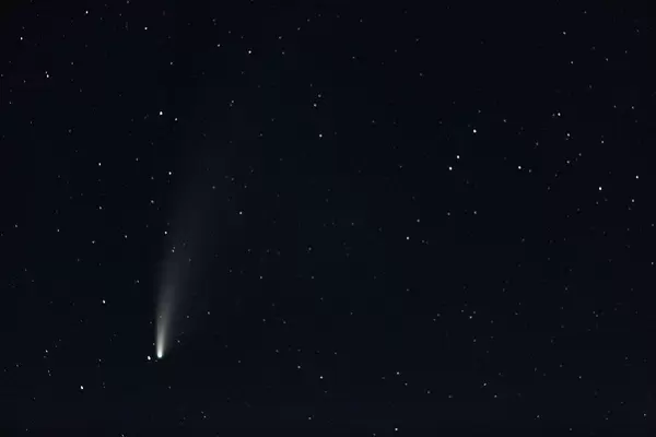 View of the comet Neowise at night among the stars