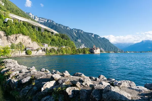 View of the Swiss highway passing above the medieval castle Chillon