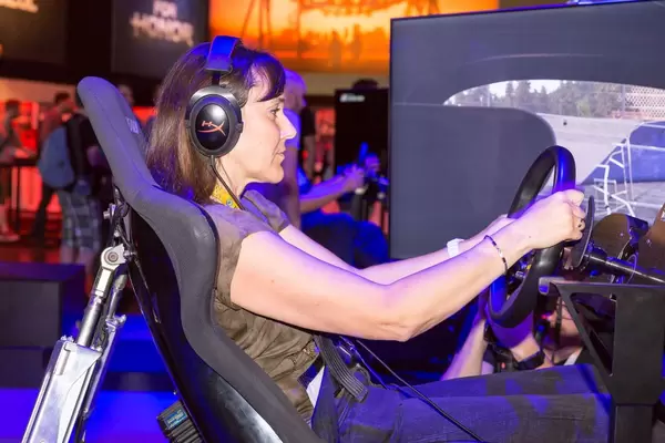 Visitor playing Need For Speed Payback - Gamescom 2017, Cologne