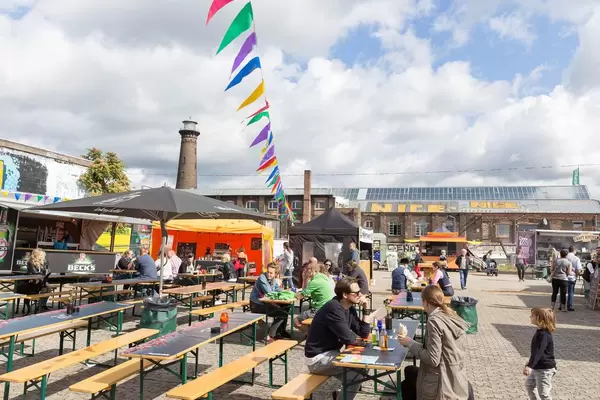 Visitors at a food festival in Cologne-Ehrenfeld