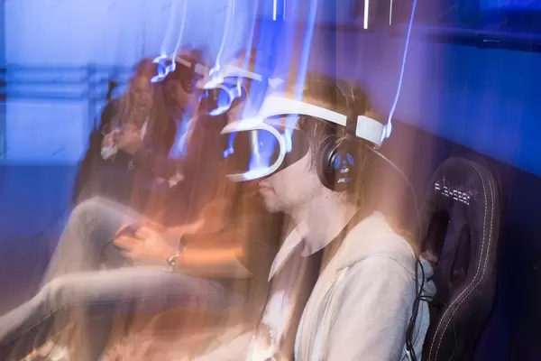 Visitors gaming with PlayStation VR headsets - Gamescom 2017, Cologne