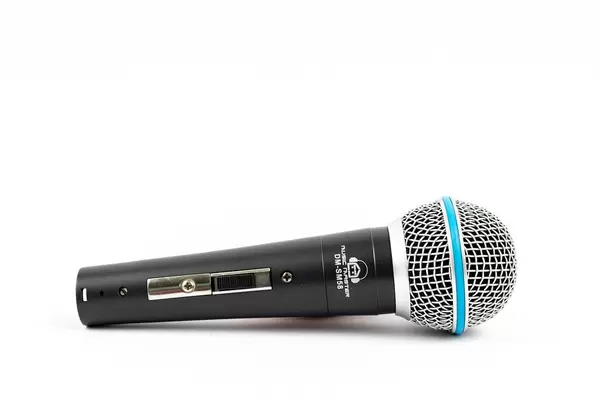 Vocal Microphone isolated above white background with copy space