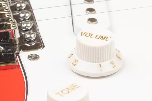 Volume Knob on the Guitar with blurred background