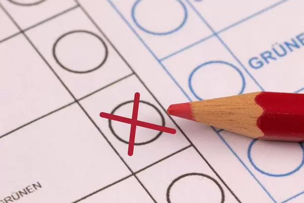 Voting paper or ballot paper with pen