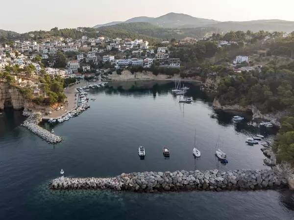 Votsi port and village in the early morning light on Alonnisos, Greece. Drone photo