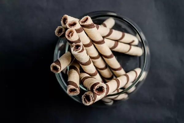Waffle rolls with chocolate, top view