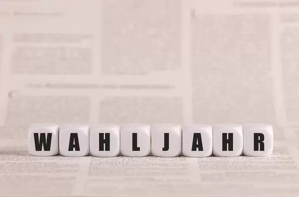 Wahljahr written with cubes on a newspaper