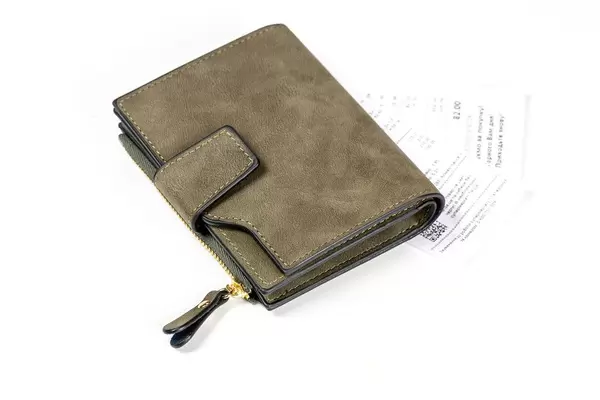 Wallet-with-receipts-on-a-white-background-concept-of-monetary-expenses-payment.jpg
