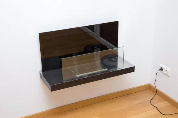 Wandmöbelstück aus schwarzem Granit und Glas